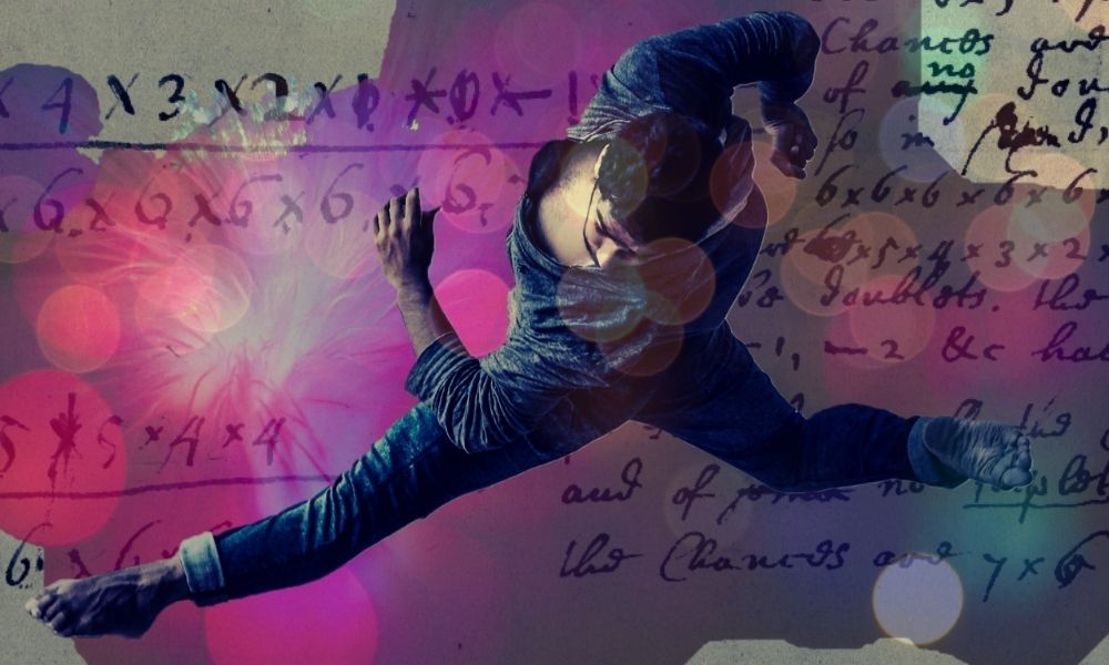 Man dancing over a backdrop of maths equations and pink and red smoke
